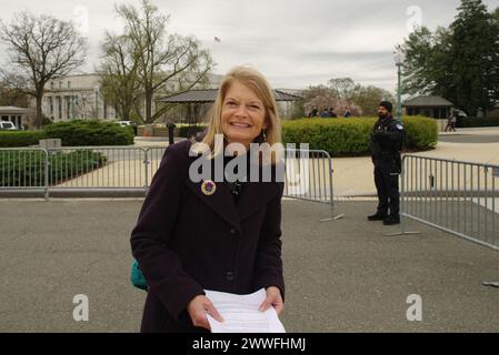 Washington, DC, USA. 22 Mar 2024. U.S. Sen. Lisa Murkowski (R-Alaska) stops for a photo at the U.S. Capitol. Stock Photo