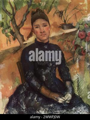 Paul Cézanne's 'Madame Cézanne in the Conservatory' (circa 1891): In the Metropolitan Museum of Art, New York, this painting shows Cézanne's wife, Hortense Fiquet, seated in a conservatory. Cézanne's focus on color and form is evident, highlighting his move towards modernism. The portrait is noted for its intimate yet distant portrayal, reflecting their complex relationship. Stock Photo