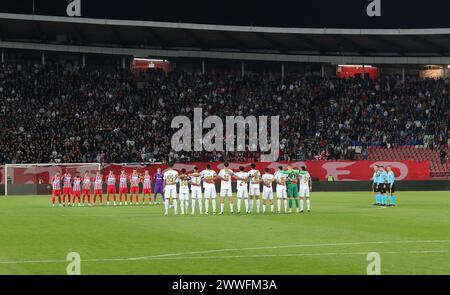 Belgrade, Serbia. 23rd Mar, 2024. Players and referees observe a moment of silence in memory of the victims of Moscow terrorist attack prior to the international friendly football match between Crvena Zvezda (Red Star) and Zenit St. Petersburg at the Rajko Mitic Stadium in Belgrade, Serbia, on March 23, 2024. Credit: Predrag Milosavljevic/Xinhua/Alamy Live News Stock Photo