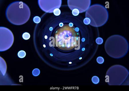 Abstract Background Texture of Lights Reflection on a Camera Lens. Stock Photo