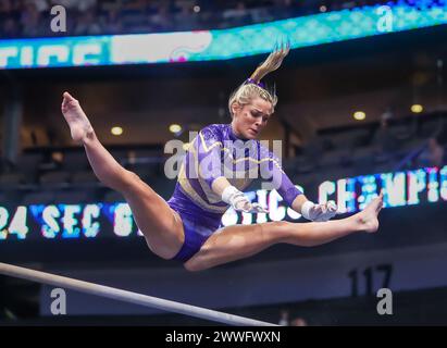 March 23, 2024: LSU's Olivia Dunne competes on the uneven parallel bars ...