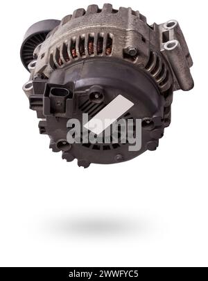 Car generator, car electrical network element on white background, generator details close-up. Spare auto parts for repair. Stock Photo