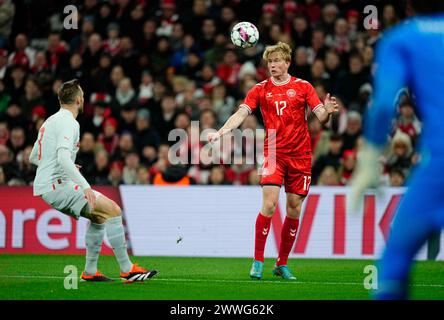 Parken, Copenhagen, Denmark. 23rd Mar, 2024. Victor Kristiansen (Denmark) heads during a UEFA Friendly game, Denmark versus Switzerland, at Parken, Copenhagen, Denmark. Ulrik Pedersen/CSM/Alamy Live News Stock Photo