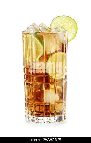 Tall tumbler full of cuba libre on the rocks cocktail garnished with a lime slice isolated on white background Stock Photo