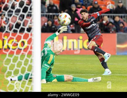 Toronto, Canada. 23rd Mar, 2024. Jonathan Osorio (R) of Toronto FC looks at the ball after shooting during the 2024 Major League Soccer (MLS) match between Toronto FC and Atlanta United FC in Toronto, Canada, March 23, 2024. Credit: Zou Zheng/Xinhua/Alamy Live News Stock Photo