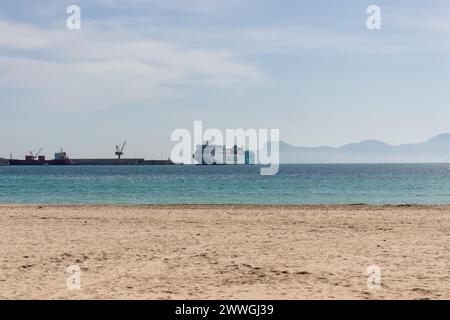 Italy Sardinia, March 30 2021: Ferry ship of the Balearia company about to dock at the port. Stock Photo