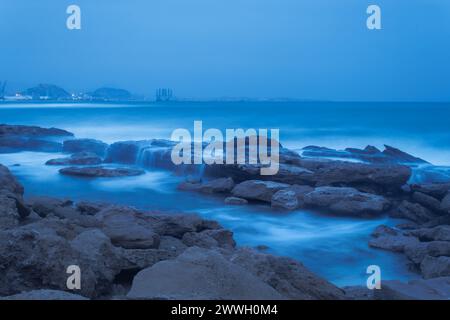 Long exposure of maritime landscape on an eastern day on the Costa Blanca, Agua Amarga beach in Alicante, Spain Stock Photo