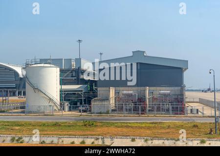 Industrial complex building with a reservoir and pipeline system for the use of water in fire fighting emergency situations on the airfield of the air Stock Photo