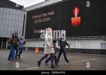 Moscow. 24th Mar, 2024. This photo taken on March 24, 2024 shows a billboard displaying the image of a candle to mourn victims of a terrorist attack in Moscow, Russia. On Friday night, unidentified gunmen fired indiscriminately at concert-goers at Crocus City Hall in suburban Moscow, causing substantial civilian casualties. In a televised national address on Saturday, Russian President Vladimir Putin vowed to identify and punish all those behind the attack and declared March 24 a day of national mourning. Credit: Alexander Zemlianichenko Jr/Xinhua/Alamy Live News Stock Photo