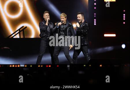 Non Exclusive: Nicky Byrne, Shane Filan,  Kian Egan  members of te Irish band Westlife performs during  The Wild Dreams tour at the Arena CDMX. Stock Photo