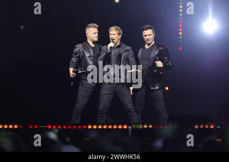 Non Exclusive: Nicky Byrne, Shane Filan,  Kian Egan  members of te Irish band Westlife performs during  The Wild Dreams tour at the Arena CDMX. Stock Photo