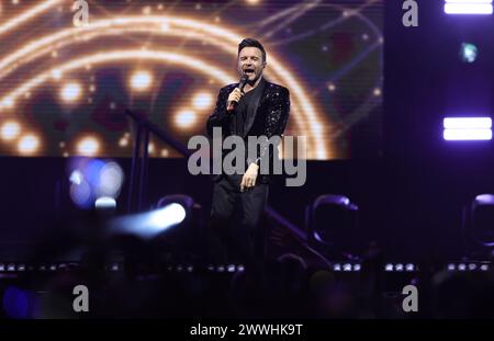 Non Exclusive: Nicky Byrne, Shane Filan,  Kian Egan  members of te Irish band Westlife performs during  The Wild Dreams tour at the Arena CDMX. Stock Photo