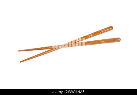 Crossed Chinese wooden chopsticks isolated on white background Stock Photo