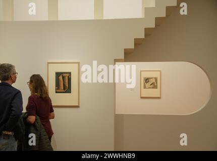 visitors at exhibition by dutch artist Escher Stock Photo