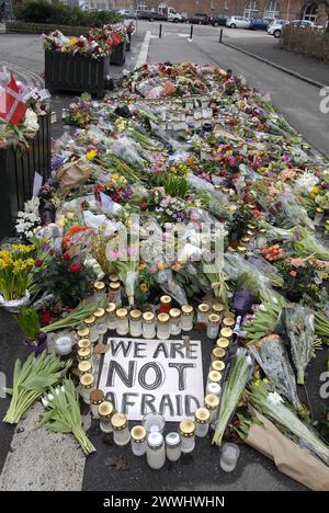 COPENHAGEN/DENMARK.  24 February 2015-Memorial of late Finn Norgaard who was died in terrorest attacked Krudttonder culture cafe  on osterbro on sunday night during debate meeting with swedish cartoonest here are various message with flowers including Danish Muslim Union with respect flowers and message and among other greetings from Canada and among local danes at his memorial site infron of krudttonder culture cafe today he has been buried and his family has requested nation please do not donate flowers at his memorial site donate money to in his fund which has been rewesly established in hi Stock Photo