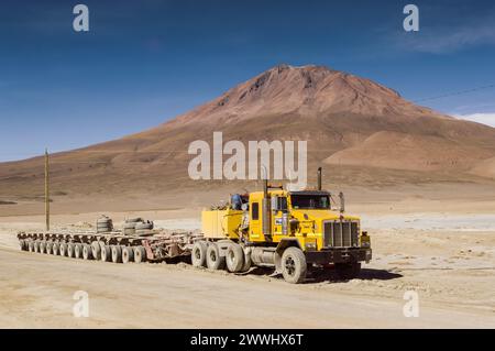 Bolivia, June 1st 2018: Majestic terrain meets industrial might in the Bolivian Highlands Stock Photo