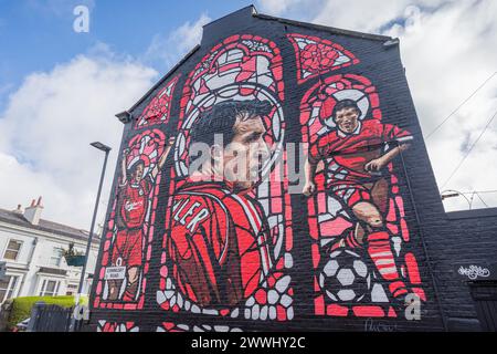 A stunning mural of former Liverpool FC striker Robbie Fowler pictured on a terrace house near to Anfield stadium in Liverpool, seen in March 2024. Stock Photo