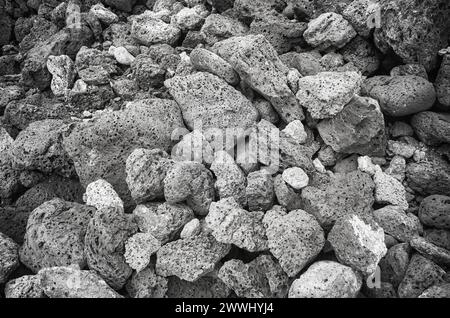 Black and white close up photo of pumice stones, nature background, Galapagos Islands, Ecuador. Stock Photo