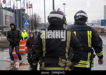 Moscow region, Russia. 24th of March, 2024. Firefighters are walking in front of the Crocus City Hall in Krasnogorsk city, Moscow region, Russia. Credit: Nikolay Vinokurov/Alamy Live News Stock Photo