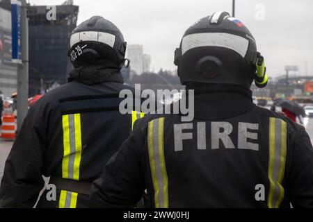 Moscow region, Russia. 24th of March, 2024. Firefighters are walking in front of the Crocus City Hall in Krasnogorsk city, Moscow region, Russia. Credit: Nikolay Vinokurov/Alamy Live News Stock Photo