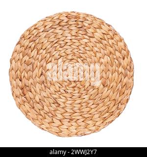 Round wicker placemat of rattan on white background in top view photography Stock Photo