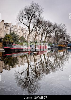 Narrowboats moored on the canal at Little Venice on the junction of the Grand Union Canal and Regents Canal, London, England, UK, Britain Stock Photo