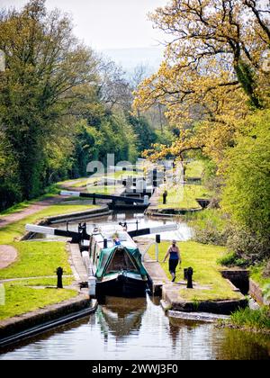 Narrowboat negotiating the Tardebigge Flight of 29 locks on the Birmingham and Worcester Canal,  England, UK, Britain, Worcestershire Stock Photo