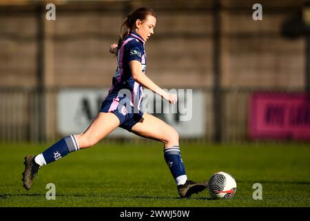 London, UK. 24th March, 2024. Morgan Searle (18 Dulwich Hamlet) in action during the London and South East Regional Womens Premier League game between Dulwich Hamlet and Sutton United at Champion Hill. Credit: Liam Asman/Alamy Live News Stock Photo