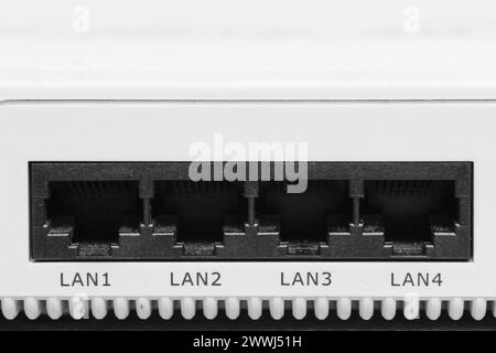 Four lan inputs on the back of the modem Stock Photo