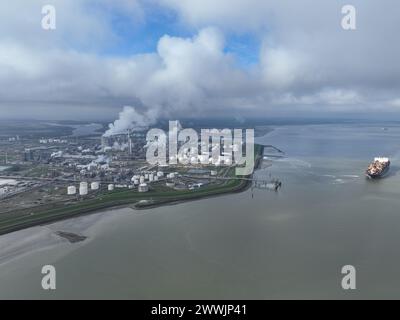 Aerial drone view of a chemical park like Dow in Terneuzen, focusing on chemical production, storage, distribution, and access through various Stock Photo