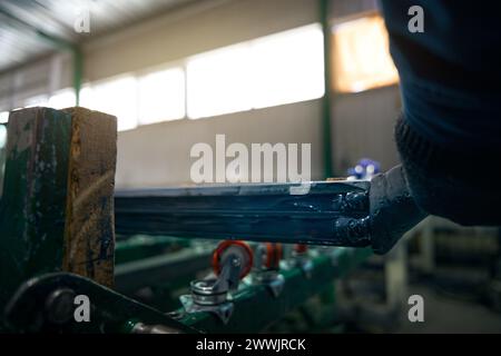 Special processing of double-glazed windows in a window production workshop Stock Photo