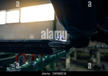 Working on a double-glazed window in window production Stock Photo