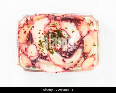 octopus carpaccio in oil in a package on white Stock Photo