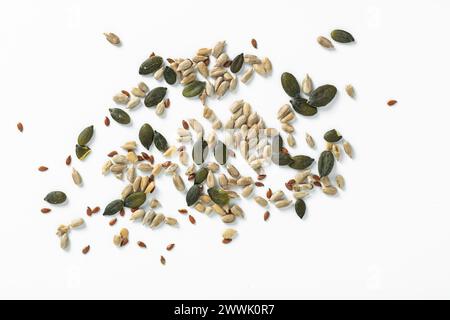 various pumpkin and sunflower, flax seeds on a white background Stock Photo