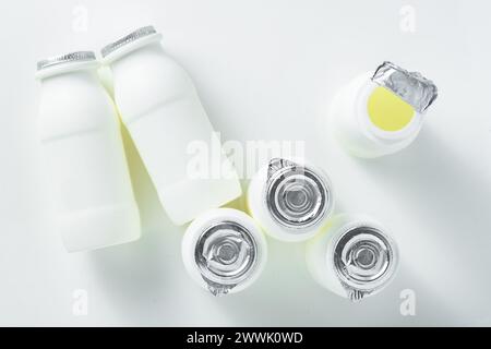 drinking yogurt with probiotic in bottles on white Stock Photo