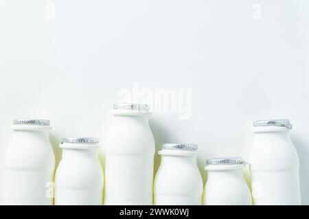 drinking yogurt with probiotic in bottles on white Stock Photo