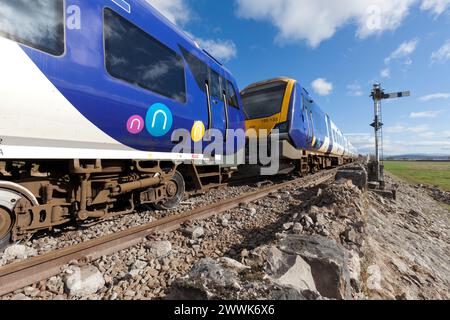 24/3/24 Grange Over Sands, Cumbria. Northern Rail class 195 trains that derailed on 22 March after a sink-hole opened under the line Stock Photo