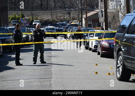 Shell casings discovered at the crime scene and marked by several ...