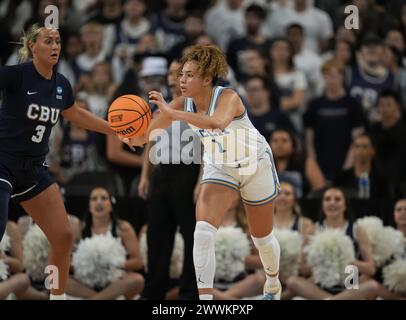 UCLA guard Kiki Rice (1) passes the ball against Illinois guard Adalia ...