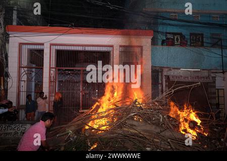 Prayagraj, India. 24th Mar, 2024. People from Hindu community fire the 'Holika' on Sunday night to celebrate Holi festival in district Prayagraj, Uttar Pradesh. Hiranyakashipu's sister, Holika, had a boon granting her immunity to fire. She attempted to trick Prahlad into a pyre, but divine intervention led to her demise while Prahlad emerged unscathed. This event symbolizes the victory of good over evil, a theme central to Holika Dahan. (Photo by Shashi Sharma/Pacific Press) Credit: Pacific Press Media Production Corp./Alamy Live News Stock Photo