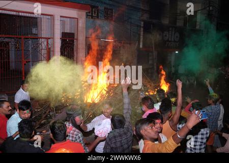 Prayagraj, India. 24th Mar, 2024. People from Hindu community fire the 'Holika' on Sunday night to celebrate Holi festival in district Prayagraj, Uttar Pradesh. Hiranyakashipu's sister, Holika, had a boon granting her immunity to fire. She attempted to trick Prahlad into a pyre, but divine intervention led to her demise while Prahlad emerged unscathed. This event symbolizes the victory of good over evil, a theme central to Holika Dahan. (Photo by Shashi Sharma/Pacific Press) Credit: Pacific Press Media Production Corp./Alamy Live News Stock Photo