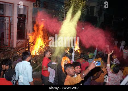 Prayagraj, India. 24th Mar, 2024. People from Hindu community fire the 'Holika' on Sunday night to celebrate Holi festival in district Prayagraj, Uttar Pradesh. Hiranyakashipu's sister, Holika, had a boon granting her immunity to fire. She attempted to trick Prahlad into a pyre, but divine intervention led to her demise while Prahlad emerged unscathed. This event symbolizes the victory of good over evil, a theme central to Holika Dahan. (Photo by Shashi Sharma/Pacific Press) Credit: Pacific Press Media Production Corp./Alamy Live News Stock Photo