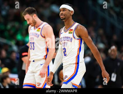 Milwaukee, USA. 24th Mar, 2024. Oklahoma City Thunder's Gordon Hayward (L) and Shai Gilgeous-Alexander react during NBA regular season game between Oklahoma City Thunder and Milwaukee Bucks in Milwaukee, the United States, on March 24, 2024. Credit: Joel Lerner/Xinhua/Alamy Live News Stock Photo