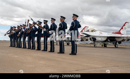 The U.S. Air Force Honor Guard stands in formation in front of a U.S. Air Force F-16 Fighting Falcons, assigned to the U.S. Air Demonstration team Stock Photo