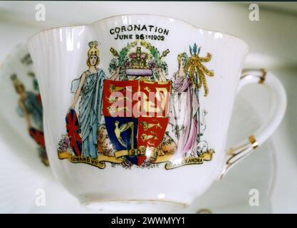 MUSTACHE CUP for tea with a coronation motif from 1902.The Coronation of King Edward VII and Alexandra of Denmark Stock Photo