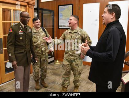 U.S. Army Maj. Gen. William 'Bill' Green Jr., chief of chaplains, shares a laugh with U.S. Army Garrison Fort Hamilton Command Sgt. Maj. Christopher Hill, deputy to the garrison commander, Raymond Santiago, and Chaplain (Maj.) Jonathan Bailey, garrison chaplain, on Feb. 2, 2024, at garrison headquarters. During his visit, Green met with garrison leadership and presided over the promotion of Lt. Col. (Chaplain) James Fisher.   Hamilton is the only active U.S. Army base in the New York City area, home to the New York City Recruiting Battalion, and New York Military Entrance Processing Station (M Stock Photo