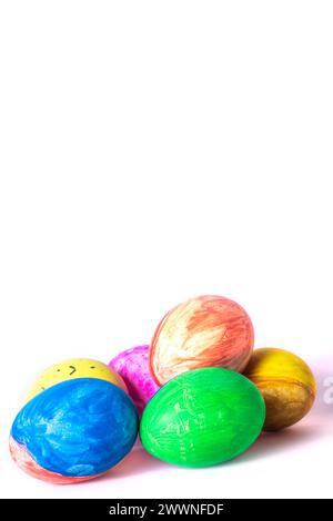 Colorful easter eggs on a white background with space for text. Happy Easter concept. Stock Photo