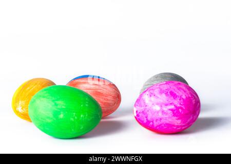 Colorful easter eggs on white background with copy space for text. Easter concept. Stock Photo