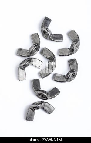 Eight iron wingnuts isolated on white background Stock Photo