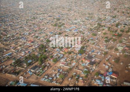 Juba, South Sudan's capital city, seen from the sky. Around 1,000 South Sudanese returnees and Sudanese refugees are crossing the border from Sudan to South Sudan every day. Sudan's war, which began in April 2023, has resulted in the world's largest displacement crisis. Stock Photo